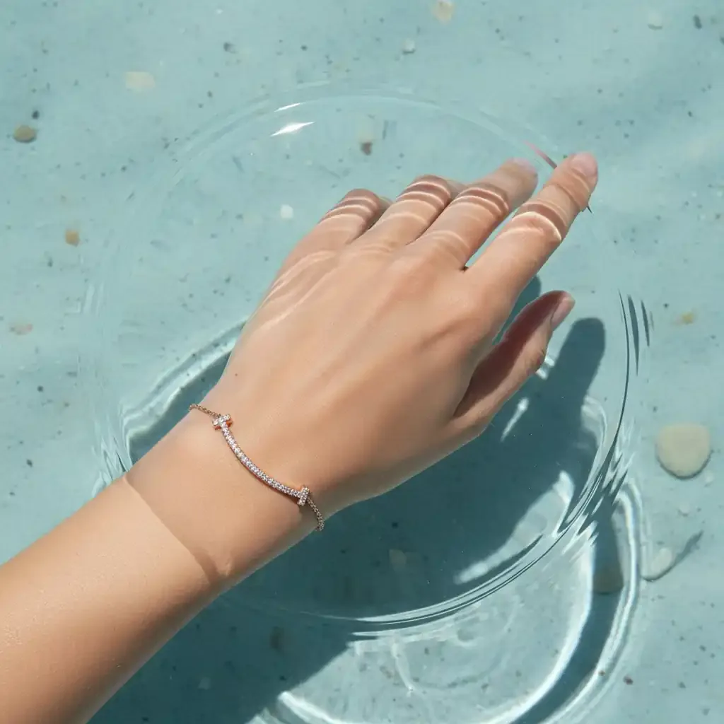 Bracelet on a hand in clear water